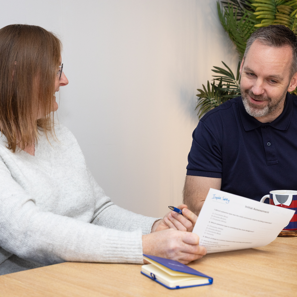 Health safety environment and quality consultancy meeting between two people