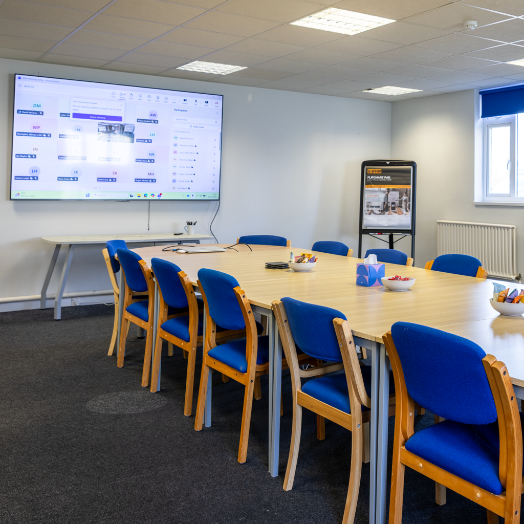 Training facilities - a large interactive screen and conference table and chaire